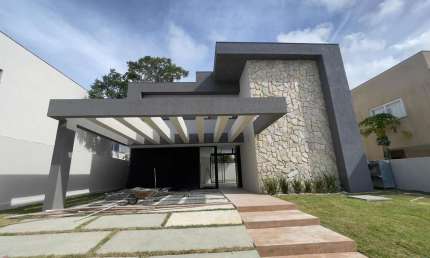 Casa duplex com 5 suítes em Alphaville Litoral Norte I