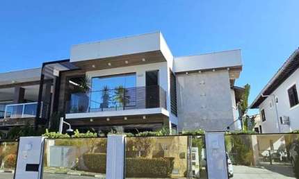 Casa com 4 dormitórios à venda, 292 m² por R$ 1.800.000 - Jockei Club - Lauro de Freitas/BA