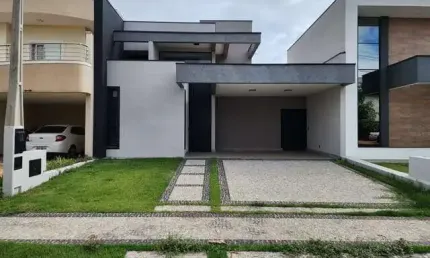 Casa térrea à venda com 3 suites, 4 vagas e 5 banheiros.