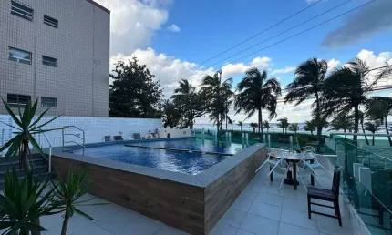 Apartamento frente mar em Praia Grande, no Flórida com 03 dormitórios.