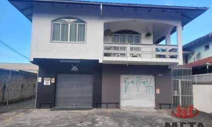 Casa com 4 dormitórios à venda por R$ 1.500.000 - Iririú - Joinville/SC