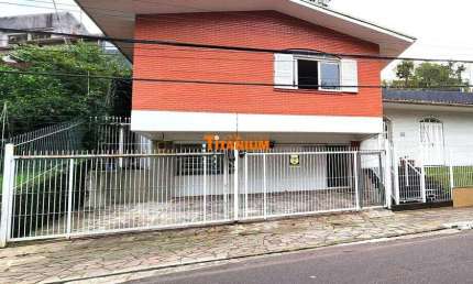 Casa 3 dormitórios, 3 banheiros à venda em Novo Hamburgo.