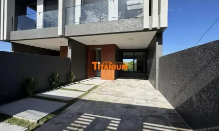 Casa à venda com 3 dormitórios, sendo 1 suíte, lareira, churrasqueira, no Bairro Rincão em Novo Hamburgo.