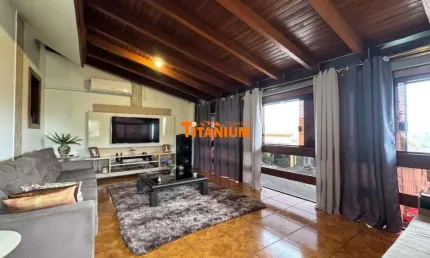 Casa à venda semimobiliada com 3 dormitórios sendo 1 deles suíte, pátio nos fundos, garagem para 2 carros, no Bairro Ouro Branco em Novo Hamburgo