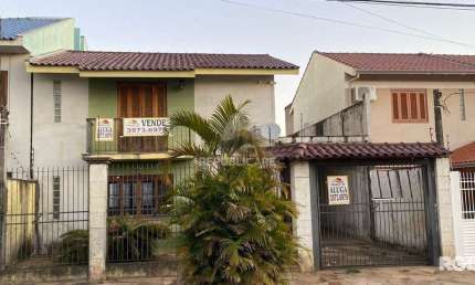 Casa à venda na Rua Martinho Lutero, localizada no bairro Harmonia em Canoas, RS