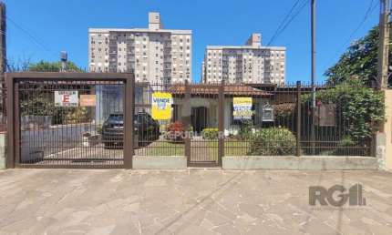 Casa com 4 quartos à venda na Rua Teotônia, 313, Camaquã, Porto Alegre