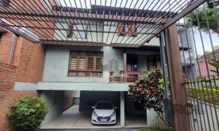 Casa 4 dormitórios à venda Teresópolis Porto Alegre/RS