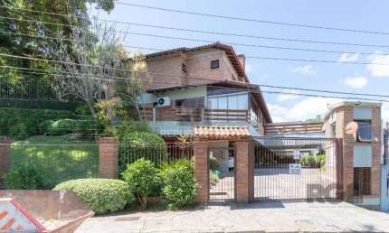 Casa em condomínio fechado para venda no bairro Jardim Isabel, com aproximadamen