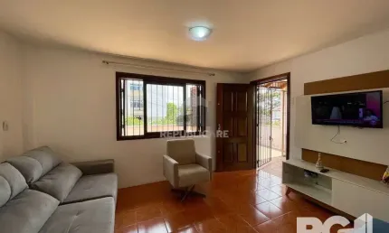 Casa com 4 quartos à venda na Rua Paulino Chaves, 735, Santo Antônio, Porto Alegre