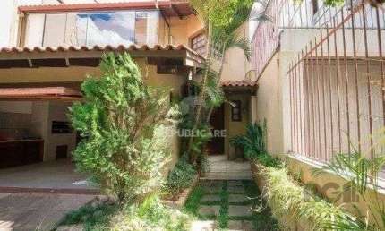 Casa 4 dormitórios à venda Rio Branco Porto Alegre/RS