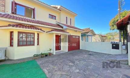Casa com 3 quartos à venda na Avenida José Corrêa da Silva, 458, Cavalhada, Porto Alegre