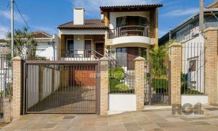 Casa com 4 quartos à venda na Rua Campos Elíseos, 196, Glória, Porto Alegre
