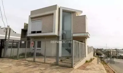 Casa com 3 quartos à venda na Rua Henrique Anawate, 520, Guarujá, Porto Alegre