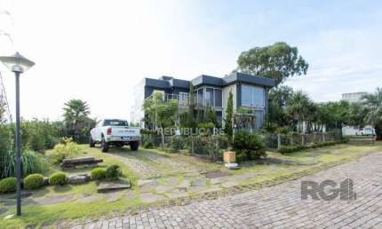 Casa em Condomínio 4 dormitórios à venda Vila Nova Porto Alegre/RS