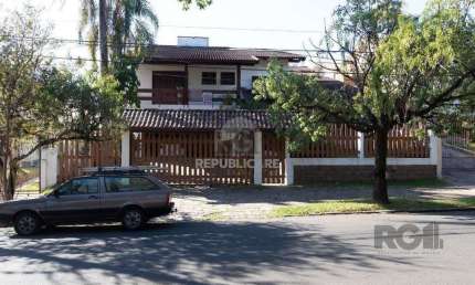 Casa com 4 quartos à venda na Rua Upamaroti, 794, Cristal, Porto Alegre