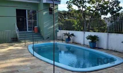 Casa com 3 quartos à venda na Rua Acesso Dos Hibiscos, 218, Santa Tereza, Porto Alegre
