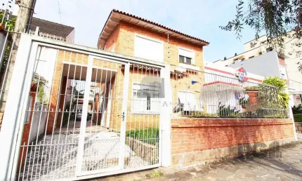 Casa à venda 4 quartos (dormitórios), suíte, 3 vagas - Partenon, Porto Alegre