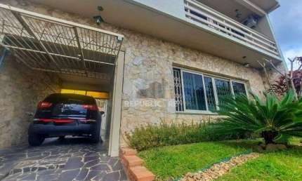 Excelente casa com 3 dormitórios e 3 vagas de garagem