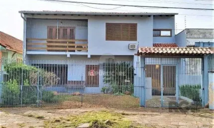 Casa com 3 quartos à venda na Rua Vítor Valpírio, 489, Anchieta, Porto Alegre
