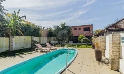 Casa com 3 quartos à venda na Rua Humberto de Campos, 1267, Partenon, Porto Alegre