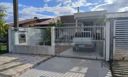 Casa de 2 dormitórios, com banheiro social, e um living em 2 ambientes, com banh