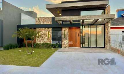 Casa 3 dormitórios à venda Zona Nova Capão da Canoa/RS
