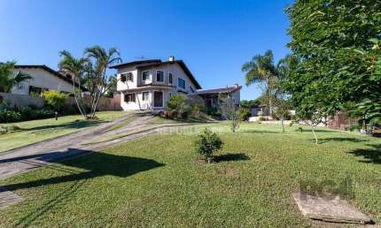 Casa 3 dormitórios à venda Vila Nova Porto Alegre/RS