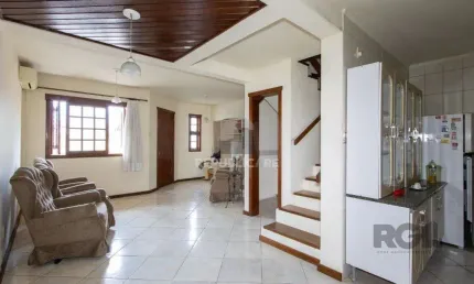 Casa em Condomínio na Zona Sul, no bairro Hípica, com 2 dormitórios, living para