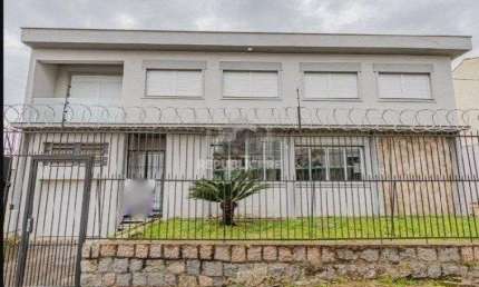 Casa para Venda - 220m², 3 dormitórios, sendo 2 suites, 2 vagas - Partenon