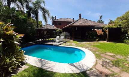 Casa em condomínio fechado com 6 quartos à venda na Avenida Juca Batista, 8000 Villa, Belém Novo, Porto Alegre