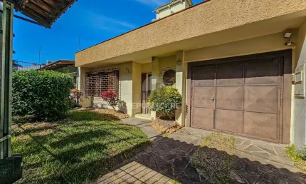 Casa com 3 quartos à venda na Rua Márcio Dias, 530, Nonoai, Porto Alegre