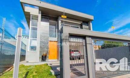 Casa 4 dormitórios à venda Marechal Rondon Canoas/RS