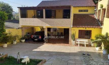 Casa para Venda - 300m², 3 dormitórios, sendo 1 suites, 5 vagas - Partenon