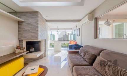 Vende-se excelente apartamento 2 quartos c/ 2 suítes, 2 vagas, living com lareir