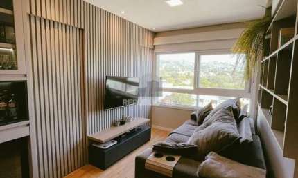 Apartamento com 1 dormitório e 1 vaga de garagem no Bairro Partenon