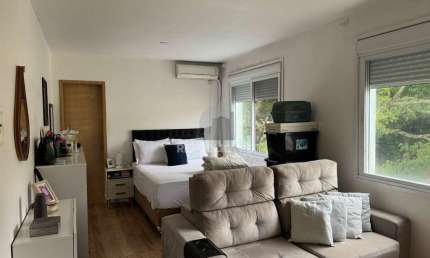Apartamento JK com garagem escriturada no bairro Tristeza em Porto Alegre