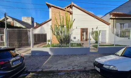 Casa com 6 quartos à venda na Rua Paissandu, 298, Partenon, Porto Alegre