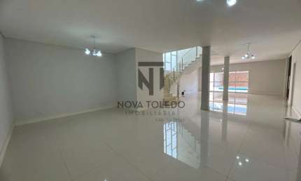 CASA EM CONDOMINIO FECHADO PARA LOCAÇÃO 5 DORMITÓRIOS SENDO 4 SUÍTES COM 680 METROS QUADRADOS.