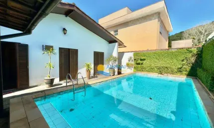 Casa com 3 dormitórios à venda, 135 m² por R$ 950.000,00 - Balneário Praia do Pernambuco - Guarujá/SP