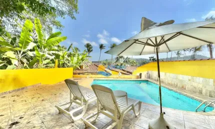 Casa com 3 dormitórios à venda, 150 m² por R$ 1.000.000,00 - Balneário Praia do Pernambuco - Guarujá/SP