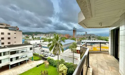 Apartamento à venda na praia da enseada, 3 quartos, 2 vagas.