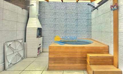 Casa com 3 dormitórios à venda, 130 m² por R$ 640.000,00 - Tombo - Guarujá/SP
