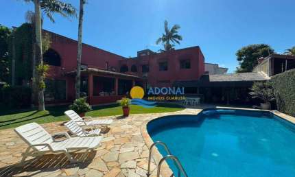 Casa com 6 dormitórios à venda, 393 m² por R$ 1.600.000,00 - Balneário Praia do Pernambuco - Guarujá/SP