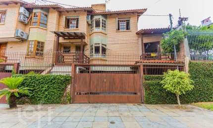 Casa com 2 quartos à venda na Rua Heitor Manganelli, 393, Jardim Itu Sabará, Porto Alegre, 126 m2 por R$ 585.000