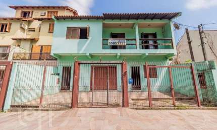 Casa com 3 quartos à venda na Rua Guadalajara, 115, Jardim Itu Sabará, Porto Alegre, 262 m2 por R$ 720.000
