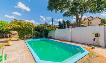 Casa com 4 quartos à venda na Rua Ary Veiga Sanhudo, 71, Belém Velho, Porto Alegre, 220 m2 por R$ 712.004