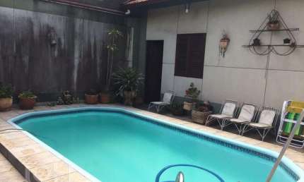 Casa com 4 quartos à venda na Avenida Guido Mondin, 424430, São Geraldo, Porto Alegre, 308 m2 por R$ 930.000