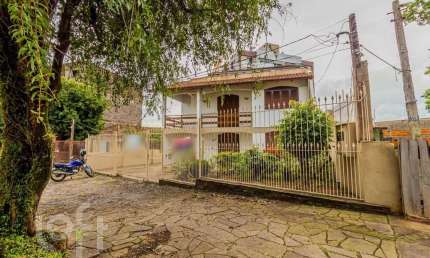 Casa com 3 quartos à venda na Rua Fontoura Xavier, 550, Cristo Redentor, Porto Alegre, 252 m2 por R$ 901.000