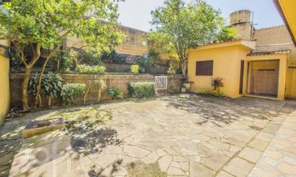 Casa com 3 quartos à venda na Rua Artigas, 320, Petrópolis, Porto Alegre, 234 m2 por R$ 1.150.000