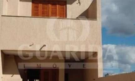 Casa com 2 quartos à venda na Rua Heitor Kramer, 640, Hípica, Porto Alegre, 124 m2 por R$ 430.000